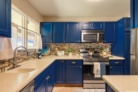 Photo of 98-1369 Koaheahe Place #989, Pearl City, HI 96782 (MLS # 202607809)