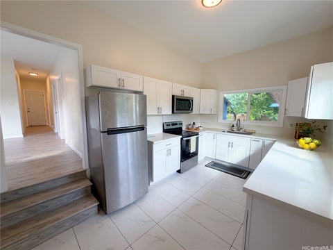 Photo of 94-111 Pahu Street #D, Waipahu, HI 96797 (MLS # 202616823)