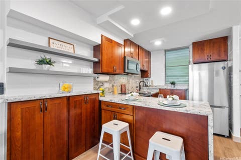 Photo of 46-260 Kahuhipa Street #C207, Kaneohe, HI 96744 (MLS # 202608352)