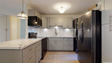 Photo of 95-273 Waikalani Drive #D302, Mililani, HI 96789 (MLS # 202611802)