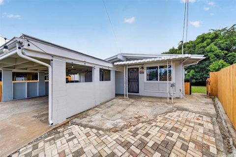 Photo of 99-229 Ohenana Place, Aiea, HI 96701 (MLS # 202610130)