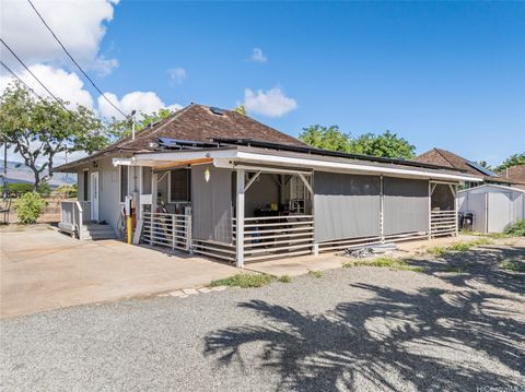 Photo of 91-1102 Paeheulu Street, Ewa Beach, HI 96706 (MLS # 202525197)