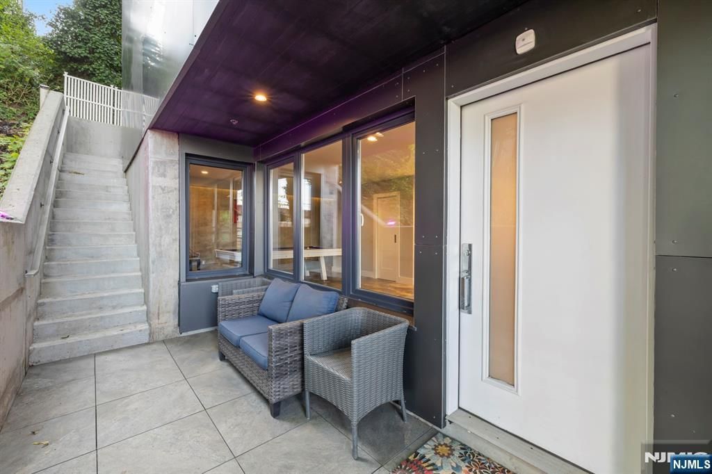 Photo of 1076 River Road, Edgewater, NJ 07020 (MLS # 25026654)