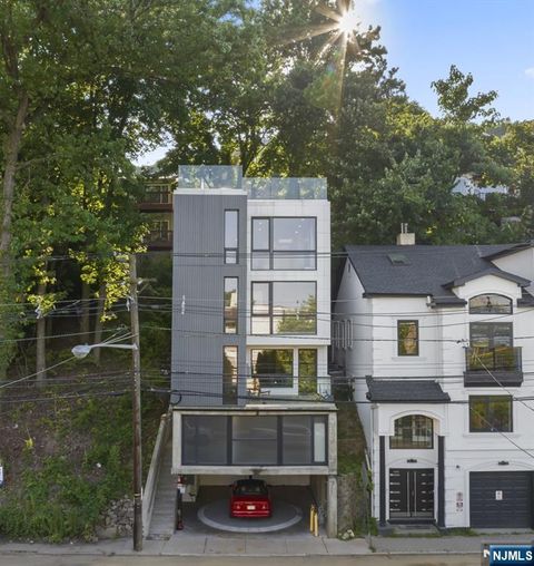 Photo of 1076 River Road, Edgewater, NJ 07020 (MLS # 25026654)