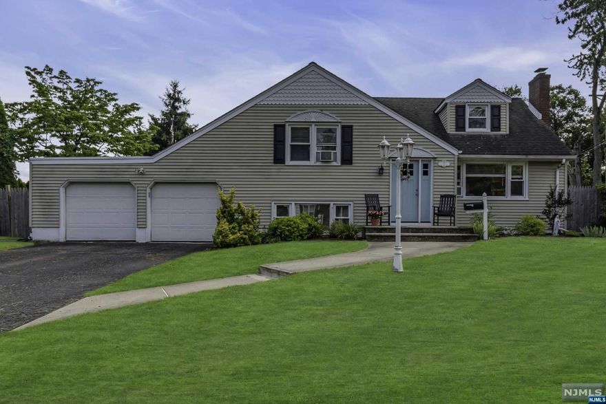 This charming split-level home offers a spacious and inviting open floor plan, adorned with beautiful hardwood floors throughout. The large living room provides ample space for relaxation and entertainment, while the well-appointed kitchen with a dining area is perfect for enjoying meals with loved ones. A generously sized family room offers versatility and comfort, ideal for spending quality time together. The first-floor bath has been tastefully renovated, adding a touch of modern elegance to the home. Upstairs, you will find three cozy bedrooms and a main hall bath, ensuring ample accommodation for family and guests. Outside, a lovely fenced-in yard provides a secure and private space for outdoor activities and gatherings. Situated in a wonderful town, this home offers convenience with proximity to shopping, transportation, and excellent schools. It presents a perfect blend of comfort, style, and location, making it an ideal place to call home.