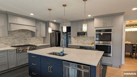 Photo of 129 Wilbur Rd, Bergenfield, NJ 07621 (MLS # 26008498)