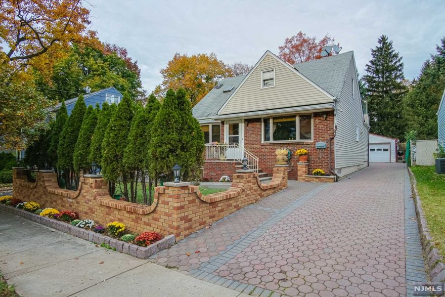 3 HUGE LEVELS OF LIVING!! SEPARATE ENTRANCE FOR EACH LEVEL! Spacious Cape Cod with a great commuter location! Short walk to local parks and green spaces. 1st floor features 2 bedrooms, full bathroom, large kitchen, dining room, family room. Second floor features two generously sized bathrooms each with their own bathroom and abundant closet space. Primary bedroom features walkout deck w/ private entrance. Large finished basement also has a private entrance and offers full bathroom, rec room, den, summer kitchen, laundry, sump pump. Beautiful paver driveway leads to detached 2 car garage.