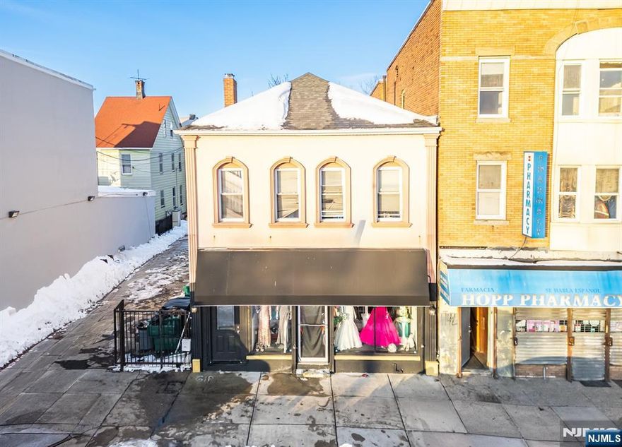 Your next income-producing opportunity is here. This mixed-use property offers nearly 2,000 square feet of ground-level commercial space, plus a well-laid-out two-bedroom apartment aboveâ€”both with separate utilities for maximum efficiency and flexibility. Positioned in an area experiencing active development and strong momentum, this is the kind of asset investors look for: versatile, cash-flow capable, and well-located. Opportunities like this donâ€™t come around often!