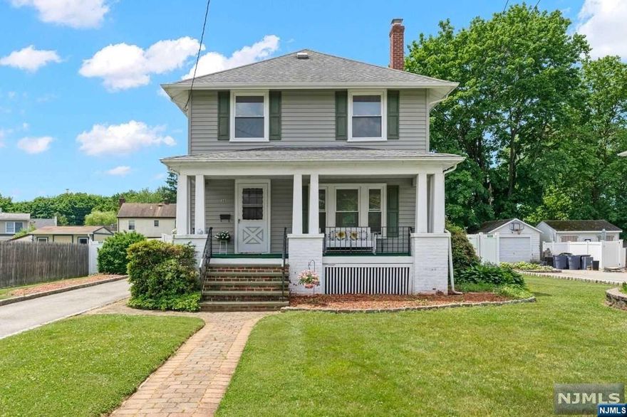 Fabulous move-in ready Colonial just waiting for your finishing touches! Relax on the oversized open front porch and enjoy a cool breeze. Charm abounds is this bright, cheery space. You are welcomed into a large living room with fireplace (as is) and formal dining room, both freshly painted and new floors installed. Spacious eat-in kitchen just off the dining room with walkout to rear yard. Three ample-sized bedrooms on 2nd level, freshly painted and new flooring. Beautifully updated oversized full bath. Large basement is partially finished, just needs some TLC, includes laundry & a powder room. Pop up attic storage. Large fenced in rear yard is a gardener's delight and is perfect for entertaining. Bus to NYC on corner, Elementary school a block away, close to Rt. 287, restaurants, shopping, parks, hiking and much more. Sale "as is"