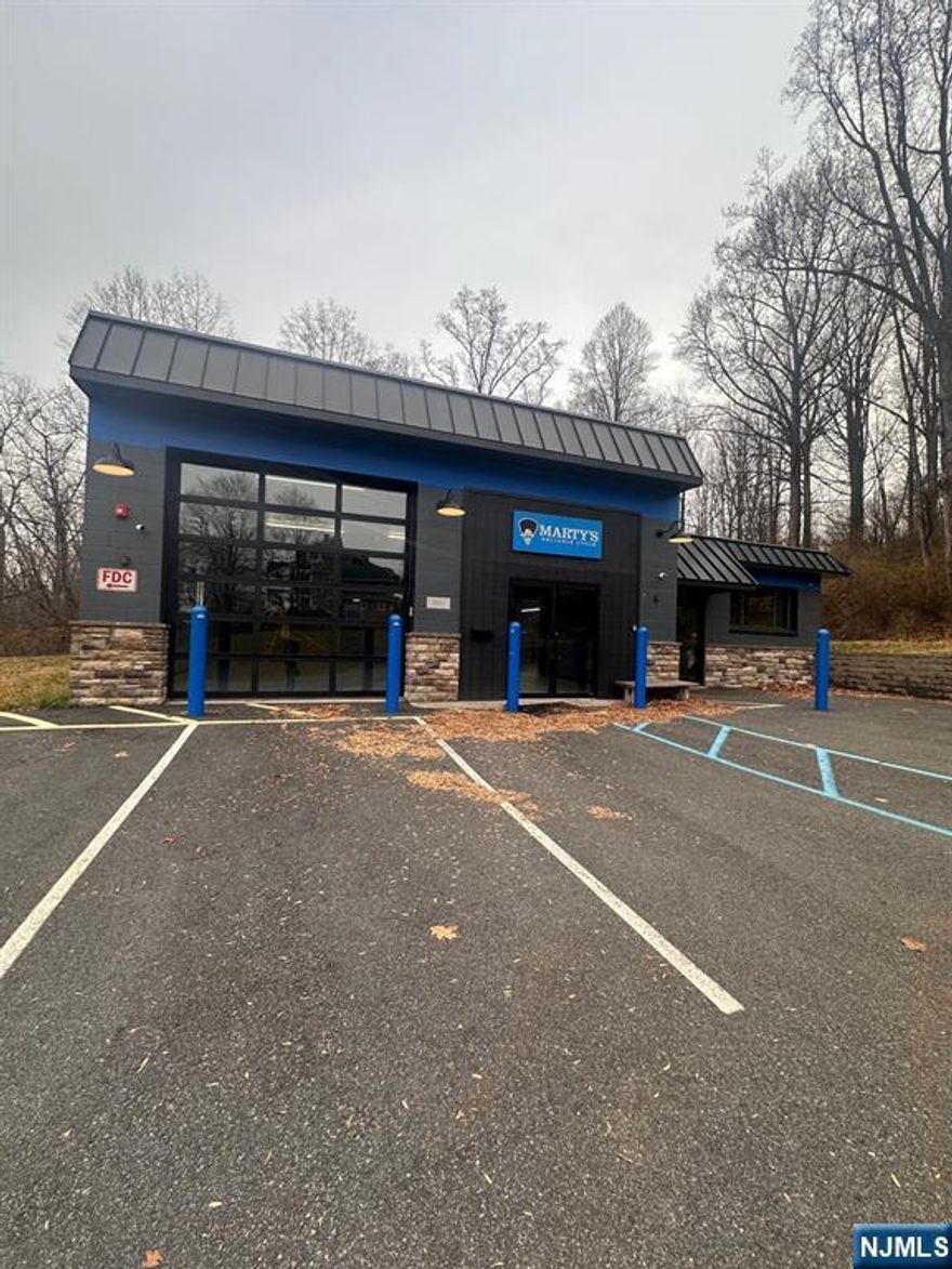 Fully renovated 3,800 SF free-standing commercial building for lease in downtown High Bridge. Features approx. 12â€™ ceilings, all-new systems, sprinklered interior, updated electric, extensive security cameras, and flexible open layout. Garage door has bluetooth controls. Cameras are wired throughout. Baseboard heat. New, efficient Ductless split cooling units. Currently outfitted with a back office and kitchenette. Building equipped with a comprehensive compressed air distribution system. Located on a 0.34-acre lot in the Downtown Business Zone with multiple permitted uses including retail, office, medical, studio, and mixed-use. Turnkey opportunity in a prime Main Street location.