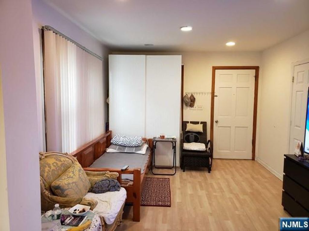 Photo of 236 E Palisades Boulevard, Palisades Park, NJ 07650 (MLS # 25036628)