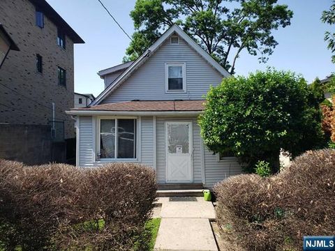 Photo of 236 E Palisades Boulevard, Palisades Park, NJ 07650 (MLS # 25036628)