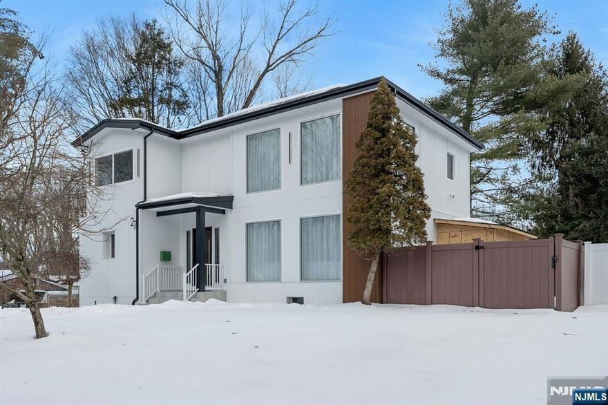 Thoughtfully rebuilt from the foundation up, this exceptional Colonial home offers a refined blend of modern design and comfort in the heart of desirable Closter. The 1st floor showcases high ceilings, an open layout, a convenient first floor bedroom, a tastefully designed kitchen, and bright living spaces filled with natural light. The 2nd floor features a main bedroom with full bath, an additional bedroom, full bath, and a separate walk-in closet/dressing room. The finished basement includes a room suitable for office use. Completing the home are a private, generously sized backyard, a two car garage, excellent schools, and outstanding lifestyle convenience with nearby shopping, dining, and parks. Easy commute to NYC. A truly special home not to be missed