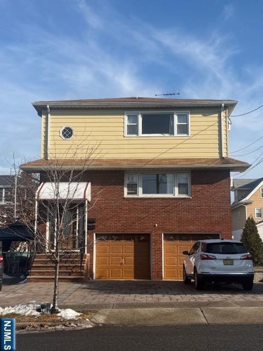 Renovated Two-Bedroom Apartment in Two-Family Home Welcome to this beautifully renovated two-bedroom apartment located in a well-maintained two-family home. This spacious residence features an open concept living room and dining room, perfect for comfortable living and entertaining. The updated kitchen offers ample counter space, and brand-new flooring runs throughout the entire unit. Enjoy plenty of closet space along with additional walk-up attic storage. Conveniently located walking minutes to New Jersey Transit train service and New York City bus routes, with easy access to shopping, restaurants, and schools. Additional features include parking. This is a non-smoking building; no pets permitted. Credit check and employment verification required. Available February 1.