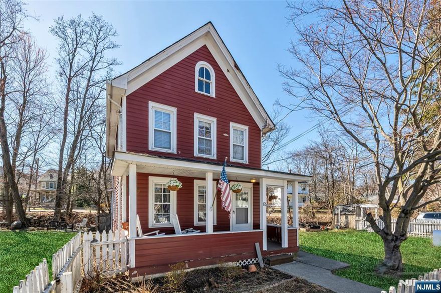 This charming 1903 Colonial blends historic character with modern updates, offering 2 bedrooms and 1.5 bathrooms. The home features an updated kitchen with stainless steel appliances, hardwood flooring on the first level, and new carpeting upstairs. A newer hot water heater and washer/dryer add convenience, while a 2019 renovation ensures a fresh, move-in-ready feel. Enjoy a spacious fenced-in yard, an outdoor deck overlooking a serene brook, and easy access to downtown shops, dining, and transportation. With low taxes and public utilities, this home is a perfect balance of comfort and convenience.