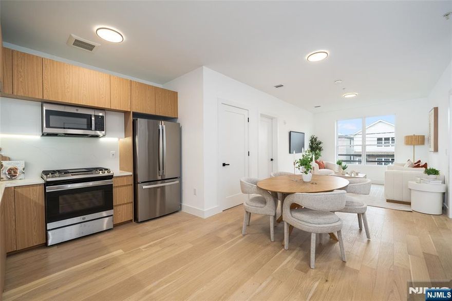 Exclusive Offer: Penthouse Unit with Seller-Paid Closing Costs! Introducing Tailor House, Hudson County's newest luxury condominium building. With just 48 residences, this boutique elevator building offers privacy, style, and convenience, only 15 min from NYC by bus. Tailor House redefines modern living with oversized 1 & 2 bedroom homes featuring open layouts, soaring 9-10 ft ceilings, & spacious bedrooms. Kitchens are equipped with waterfall quartz countertops, sleek islands in select units, European style two-tone oak cabinetry & GE Professional Series appliances. Bathrooms offer floor-to-ceiling porcelain tiles, glass-enclosed showers, and marble-top vanities, creating a spa-like atmosphere. Amenities include a fitness center, luxury lobby, garden terrace, & smart security with Swiftlane intercoms. Assigned parking is included, with extra spaces available for purchase. Plus, enjoy the added benefit of a 5-year tax abatement. Discover a lifestyle of luxury and convenience nestled in the heart of historic Union City.