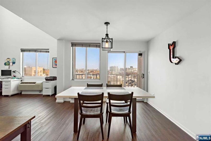 Move right into this stunning spacious duplex with vaulted ceilings. Unobstructed NYC/Hudson River Views. Fully renovated kitchen with stainless steel appliances, custom cabinetry, and new tiles. Open floor plan offers oversize living and dining room leading to 2 terraces perfect for entertaining. Both bathrooms have been completely renovated. The second level loft has been converted to a private bedroom with new built-in closet and an attached office/music studio that can also be used as a bedroom for guests. 1 Deeded parking space included in the sale. Prime location with stores, shops, restaurants at your doorstep. Bus stop to NYC conveniently located nearby. Welcome home!