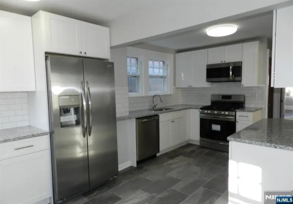 Photo of 23 Tiffany Pl, Irvington, NJ 07111 (MLS # 25033112)