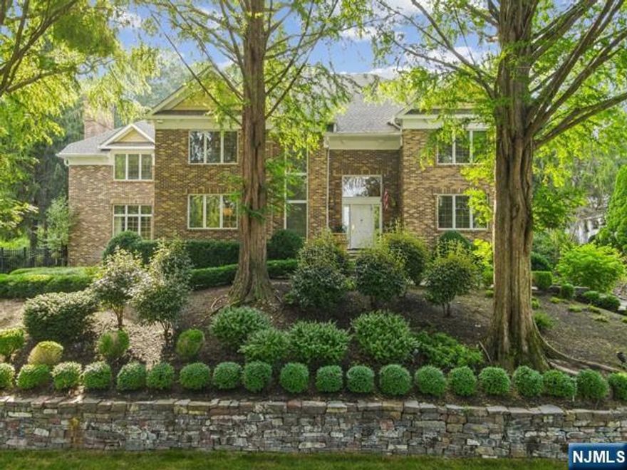 Discover the epitome of suburban luxury in this stunning colonial-style Lenard home nestled in prestigious Upper Saddle River. Boasting 5 bedrooms & 5 full baths, this residence offers unparalleled comfort & elegance. Upon entry, you are greeted by a grand marble foyer leading to expansive living spaces adorned with exquisite finishes & meticulous craftsmanship. The gourmet kitchen is a chef's delight, featuring Miele & Wolf appliances, granite countertops, radiant heated floors & a center island perfect for culinary creations. Entertain in the formal dining room or gather in the great room, adorned by a custom stone wall fireplace. The finished basement provides additional space for recreation. Retreat to the luxurious primary suite with a spa-like bath. Four additional bedrooms ensure plenty of room for loved ones. Outside, enjoy the lush landscaping & peaceful surroundings on your private grounds & an in-ground heated gunite pool.