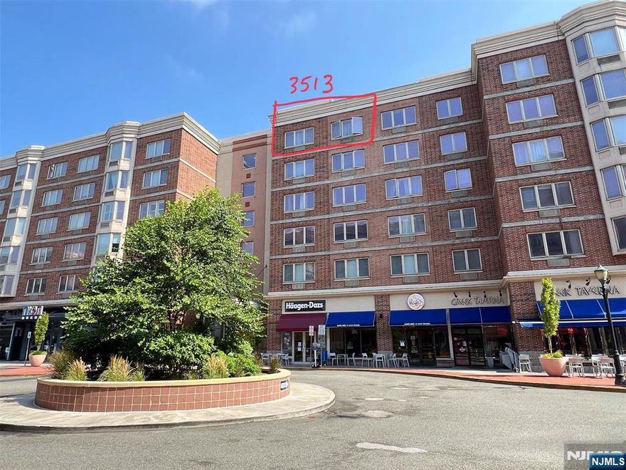 Unit 3513 at The Peninsula Condominium is a bright, southern-exposure 950 sq. ft. 1BR corner unit on the top floor with soaring 10-ft ceilings. The home features hardwood floors throughout, an open kitchen with black granite countertops, wood cabinetry, and stainless steel appliances. The spacious bedroom includes a walk-in closet, and there is an in-unit washer/dryer. The Peninsula offers 24-hour concierge service and complimentary garage parking. Investors are welcome, and the building is pet-friendly (under 30 lbs). Ideally located along the Hudson Riverfront Walkway, with shops, cafes, and restaurants just steps away. Commuting to NYC is easy with NJ Transit buses #156, #158, and #159 right on River Road.