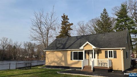 Photo of 54 Riverview Circle, Little Falls, NJ 07424 (MLS # 26010374)