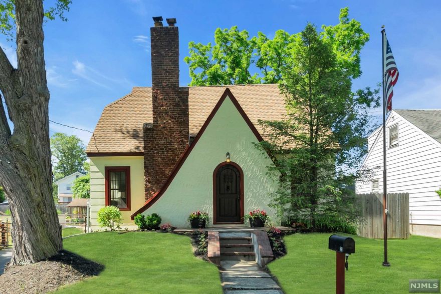 HOME SWEET HOME! This lovely Tudor sits pretty on a double lot and is perfect for entertaining! The first floor boasts a living room w/ charming stone fireplace, dining room, h/w floors, first floor bedroom, updated 1/2 bath, cheery kitchen showcasing a Chambers Stove and breakfast room w/ walkout. Second floor features 2 bedrooms w/ plenty of hidden storage space and tastefully decorated full bath. Other highlights of this home include newer electric, ductless mini split A/C/Heat units, updated windows, 2 car garage w/ overhead attic storage, 32' A/G pool, w/ newer sun deck and detached four season room your friends will be envious of. Enjoy the Wayne lifestyle and participate in all the town has to offer while still being close to highways, shopping and NYC transportation!