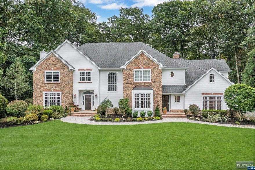 Fabulous opportunity to get in before school! Luxurious Manor on 1.35 acres boasting a resort-like backyard with a heated pool, patio with kitchen and pool house with a living room, kitchen & full bath. Prepare for elevated style and comfort throughout the grand interior with smart-home features just a click away, radiant heated flooring on 1st floor & in all bathrooms, 3 fireplaces and a 3 car attached garage. Two story entry greets you to a bright & updated open layout with a stunning renovated gourmet eat-in kitchen with top-of-the-line appliances & butler pantry at the heart of the home. Living room, banquet-sized dining room, family room with coffered ceiling & French doors to patio, office/bedroom, playroom, mudroom and half bath complete the 1st level. Oversized primary suite with spa-like bath, 2nd ensuite & 2 more sizable bedrooms sharing a full bath on 2nd level. Prime location with secondary access via a quiet cul-de-sac. Don't miss out - seller looking for quick close!