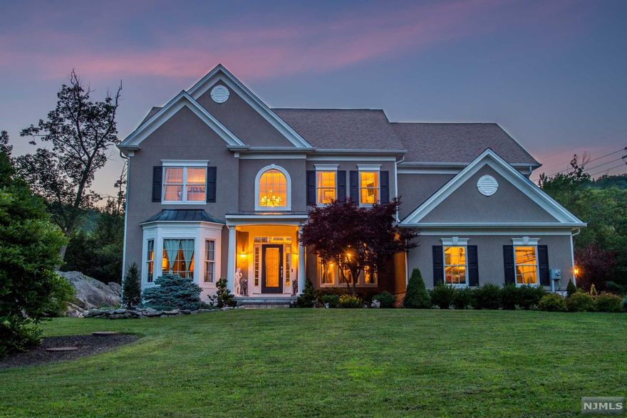 WELCOME TO TRANQUILITY! This elegant residence sits on almost 3 acres of land at the end of a cul-de-sac and offers luxurious living in a stunning location planned for maximum privacy. Built to the highest standards, this home features extensive luxury design details throughout including a marble foyer entry, great room with outstanding custom fireplace, gourmet kitchen, custom millwork, coffered ceilings, artisan dome and more. The master bedroom boasts a 2nd custom fireplace, the ultimate dream closet & a spa-like master bath. Work from home in your private office, then enjoy the extensive flat open yard that can accommodate a pool, horse stables, or even a tennis court. Your choice! Come see everything this beautiful property has to offer, add your personal touch and make this your new home today.