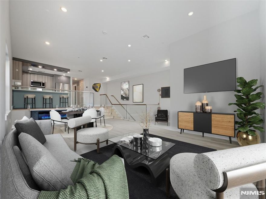 PROMOTION: Get a free month on 18+ months lease! Available now: this stunning new construction unit offering Shared Backyard and 2 Private Parking spaces can be your new home! Open your entry door to this modern apartment featuring 2 bedrooms, 2 bathrooms, open concept living space with LED electric fireplace, wrap around windows that flood the area with natural light, higher ceilings as this is the top floor unit. The apartment faces southeast offering NYC skyline views as well as sunsets. The chefâ€™s kitchen features white high-gloss European Style cabinetry, stainless steel premium appliances, modern backsplash, central island with plenty of room on the counter space. This unit offers a relaxing spaâ€“like bathroom with silver hardware and luxurious vanity. Other perks include big washer and dryer in unit, central/heat/air, and Intercom System. NYC transportation, restaurants and shops at your fingertips.