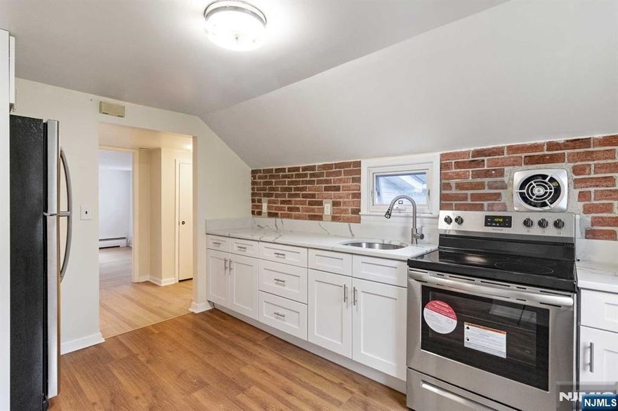 Newly renovated 2nd floor unit in a 3 family home (this unit is the top floor). Brand new kitchen and bath installed. Freshly painted. off street parking in large driveway. Private entrance. Shared laundry in basement.