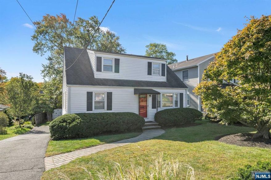 This lovely four bedroom one bath home, is conveniently located to schools shopping highways transportation to New York City. Large outdoor deck overlooking Well, manicured, lawn and landscaping.