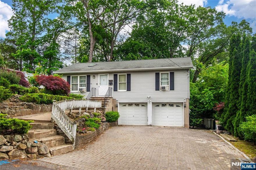 Welcome to this inviting 4-bedroom, 2.5-bathroom raised ranch, nestled on a quiet street in Butler. This spacious home offers a comfortable layout. The main level features 3 good sized bedrooms with reset lights, closets with lighting inside, kitchen features skylight windows for added natural light, pantry has off-set lighting, access to deck from kitchen ideal for morning coffee. Ample space livingroom also with skylight for more natural light. Pull-down attic with a thermostat-controlled exhaust fan for even more storage options. Well cared wood floors throught-out the first floor. Ground floor offers 1 bedroom with full bathroom and a family room or can be used for home office, gym or playroom, house has a reverse osmosis. Comfortable size backyard, the oversized two-car garage provides ample parking with additional driveway space for guests. Ideally located close to Butler schools, shopping centers, major highways, and direct bus routes to NYC, this home offers a perfect blend of comfort and convenience. Do not miss the chance to make this home your own. Schedule your visit today and bring your imagination!