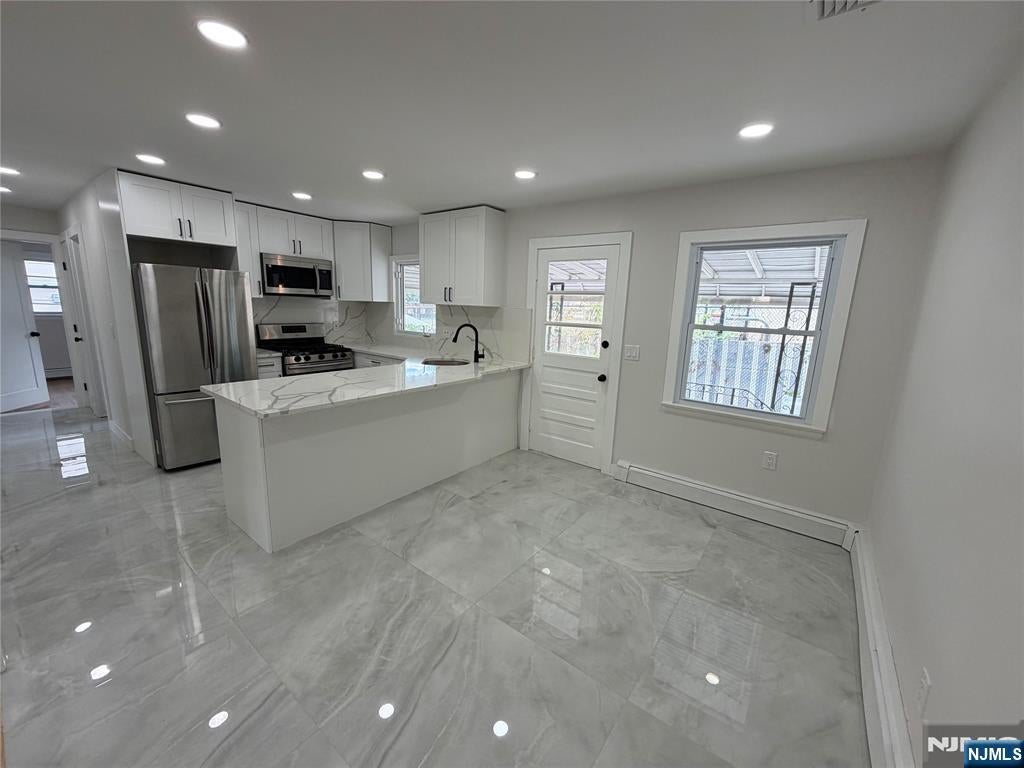 Photo of 310 Passaic Avenue, Carlstadt, NJ 07072 (MLS # 26019866)