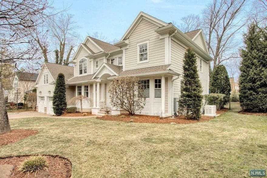 Beautiful Center Hall Colonial located in one of Demarest East Hills' most exclusive neighborhoods. Enter this Architectural Digest designer home featuring a spacious open floor plan and offering approx. 7,000 sq. ft of living space. Wide plank wood floors flow throughout the main level, which features several beautiful, sunlit rooms for family gatherings. Banquet-sized DR leads to custom chef's kitchen with spacious eat-in area and chef-grade appliances. LR, Study, Fam Rm all are masterfully complete w/fplcs. 2nd level boasts a magnificent Master suite w/fplc, marble bth, and his/her walk-in closets; 3 addtl. spacious bdrms w/2 full bths, plus bonus room. Finished basement w/bdrm, full bth, media rm, gym. Large, private backyard features in-ground Pool w/hot tub and outdoor surround sound. Home fully wired for sound and beautifully landscaped plus generator. Blue ribbon schools, close to NYC. A special home for the discerning buyer that will not last.