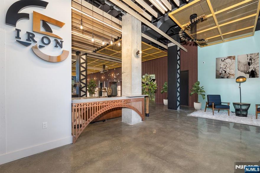 IRON65 - MODEL 11 - 1 BED APT + FLEX + DINING ROOM + 1.5 BATHS Luxury Apartments in the Heart of Newark's Ironbound District. Welcome to Iron65, a premier luxury residential building completed in 2024, offering sophisticated urban living with top-tier amenities. Located at 65 McWhorter St, Newark, this brand-new complex is within walking distance to Newark Penn Station, making your commute to NYC Penn Station under 20 minutes by train. IRON65 features a variety of modern floor plans, including studio, studio flex, 1-bedroom, 1-bedroom flex, lofts, and 3-bedroom duplexes, all designed with high-end finishes and state-of-the-art appliances. Residents can enjoy a live, work, play lifestyle with access to amenities such as a fully equipped gym, yoga studio, cold plunge, saunas, a rooftop with breathtaking NYC views, an outdoor kitchen and BBQ area, a serene lounging area, and a recreational room. For those working remotely, the building offers a Flex workspace with high-speed internet for a seamless work-from-home experience. IRON65 offers the perfect blend of style, comfort, and convenience in the vibrant and culturally rich Ironbound neighborhood, known for its diverse culinary scene and lively atmosphere. Don't miss your chance to experience this dynamic urban lifestyle at IRON65. Schedule a tour today!