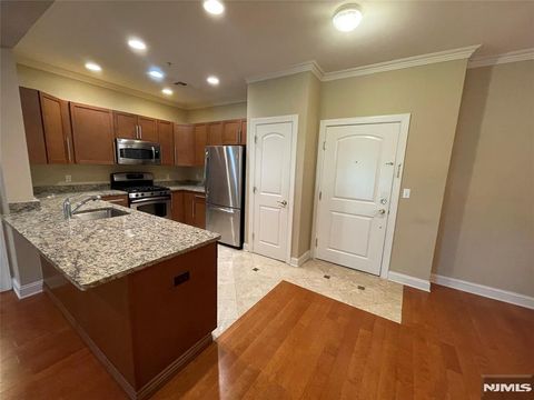 Photo of 1107 Windsor Park Ct #107, Englewood, NJ 07631 (MLS # 25034571)