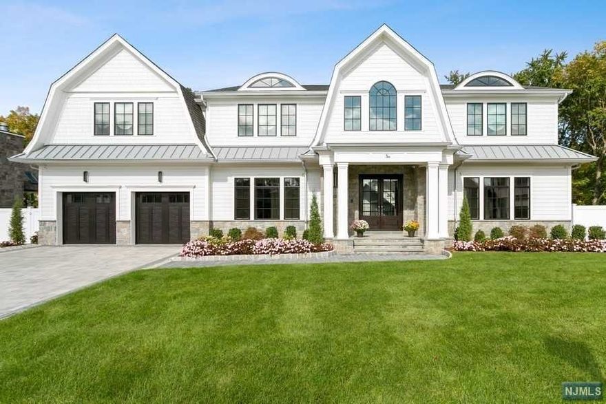 Be prepared to be WOWED! Welcome to a true LUXURY, architectural designed home with approximately 5,500 Square Feet of living space. Located on a newer development/cul-de-sac. This exquisite home offers state of the art kitchen design with quartzite countertops, top of the line appliances, butler pantry, Family Room, Office/Den, Dining Room, Mud Room, Master Bedroom Suite w/Master Bath, 4 additional bedrooms (all with walk-in closets), 3 1/2 additional bathrooms, including coffered ceilings & well crafted mouldings throughout! Finished Walk-Out Basement, Radiant heat flooring, high end Light Fixtures, outdoor BBQ Grill, inground gunite heated Pool, impeccable Landscape, surround sound system, security system...literally no details spared! Not to mention minutes away from NYC transportation (including Ridgewood NYC Train Station), walking trails/parks/dog run, shopping centers & so much more. One of the finest designed homes in town! A lifestyle awaiting you!