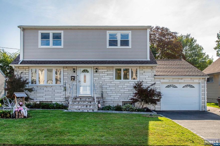 THIS IS IT! Introducing a captivating Clifton gem in the sought-after Richfield section! This delightful home offers an inviting living space with 4 bedrooms, 2 bathrooms, and a finished basement. Step inside to discover a spacious living room, elegant dining area, and a beautifully renovated kitchen that seamlessly opens up to a deck, perfect for hosting unforgettable gatherings. The first floor boasts a private primary bedroom and a luxurious full bathroom for your utmost comfort. Upstairs, you'll find 3 additional bedrooms, a stylish full bathroom, and a bonus office space, ideal for those working from home. The finished basement includes a convenient laundry room, making chores a breeze. Outside, your very own backyard oasis awaits, complete with an above-ground pool, providing endless relaxation and enjoyment during warmer days. With Urma Ave Park just a stone's throw away, you'll have nature's playground right at your doorstep. Plus, being close to schools and NYC transport