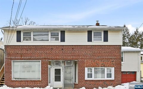 Photo of 210 River Rd, New Milford, NJ 07646 (MLS # 26011076)