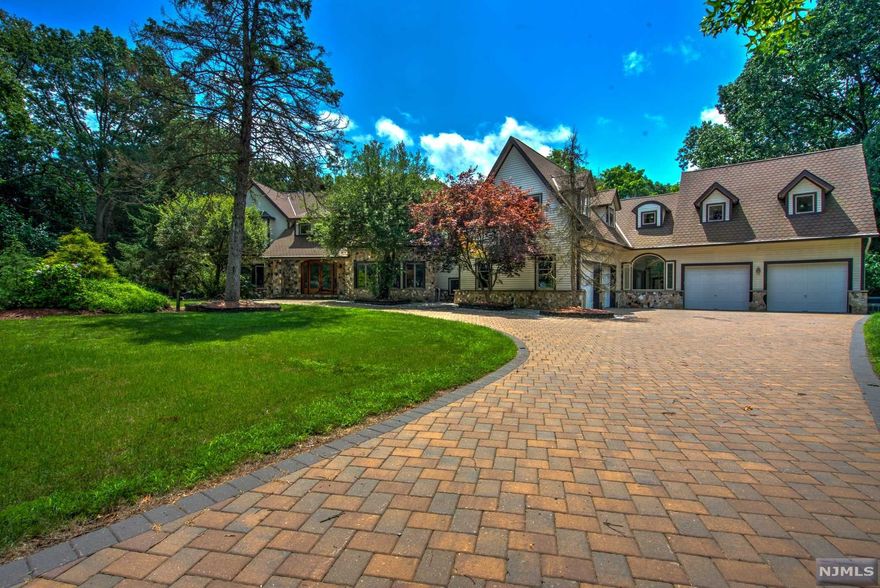 Welcome to this serene Franklin Lakes estate! Boasting over 9,000 sq ft of living space, this sprawling home has an abundance of space, character, and has been meticulously maintained by the previous owner! Built in 1997 this home features extensive landscaping, granite facade and multi-level wrap-around patio, and circular paver driveway. Enjoy the peaceful wooded backyard which backs to Parsons Pond Park. Inside you'll find newly painted rooms, a designer kitchen, stone and hardwood floors, grand entry, and a first-floor bedroom. Bedrooms on the second floor each with en-suite bathrooms. The master bedroom suite features walk-in closets, office/sitting room and an expansive brand new bathroom. The basement is finished with an abundance of storage rooms, laundry, gym, sauna, walk-in wine cooler, and workshop. Just too many features to list! More information available upon request. If you are searching for luxury in a tranquil neighborhood this could be the one!