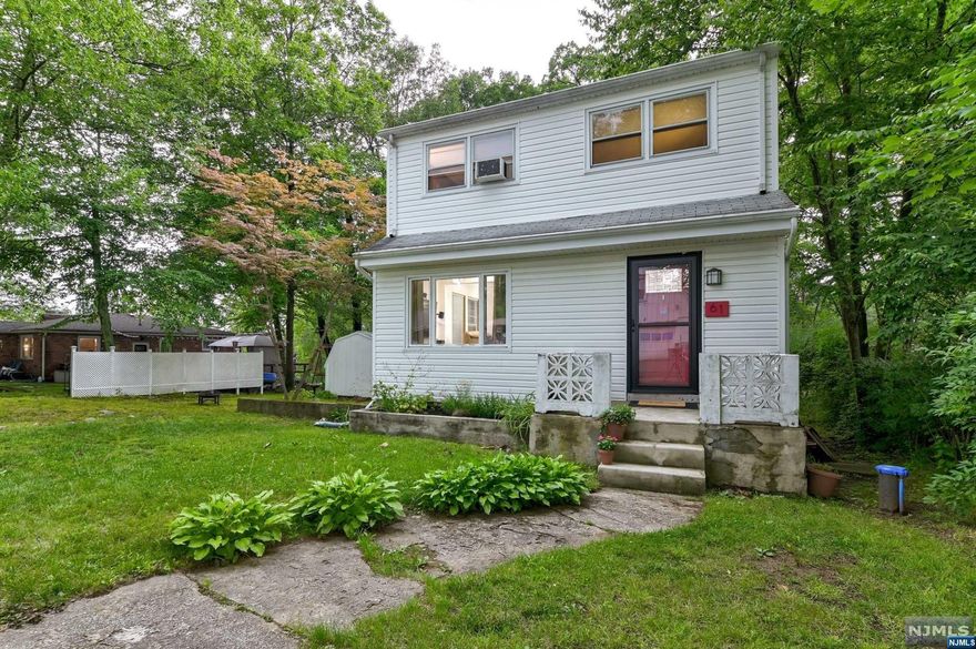 Welcome home to Ringwood lake living at Erskine Lakes. This charming 2 bedroom, 1.5 bath home is located in the highly sought-after Erskine Lakes neighborhood and is within walking distance to picturesque Little Beach with three beaches, clubhouse and social events throughout the year. Step inside to the inviting eat-in kitchen featuring hardwood floors and a large pantry. The open-concept living room and dining room area has hardwood flooring and plenty of natural light. This area has been thoughtfully modernized with Alexa-enabled Ring heating, lighting along with surround sound transforming your movie nights into a private theater-like experience.The large flat yard is waiting for you to create your own private retreat. Located close to transportation, state parks, hiking, Monksville Reservoir, Rt 287, 45 minutes to NYC. Lake membership optional. Home is strictly AS IS.