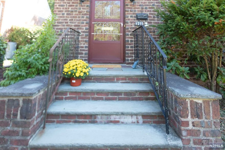 Move right into this suburban gem of charming Tutor Colonial style house. - located in a very convenient quiet street and neighborhood. This sophisticated home features 3 bedrooms, 3 full baths - one on each floor. The main floor has a nice flow and gives easy access to the backyard, spacious living room, kitchen with eat-in breakfast , formal dining room, den, enclosed porch, hardwood floors throughout. The upper level of this versatile home features 3 bedrooms and full bath. On the completely finished with ceramic tile flooring basement could make it as Home office/ Gym/ Recreational room, a bath room, laundry and storage. 1 car detached garage with long driveway. Close to schools, shopping and NYC transportation. Please do not miss this great house.