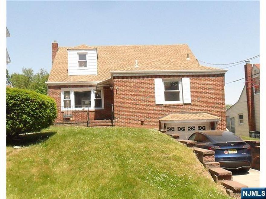 Set on a residential street in Passaic Pk this home features a spacious living area full of sun, hardwood floors, finished basement, and large deck. Short distance to places of worship and schools. First floor has a large living room, kitchen, dining room, 2 bedrooms and full bath. Sunroom off kitchen leads to a large outdoor deck and backyard. Second floor has a large bedroom, second room can be used for an office, and full bath. The finished basement features a large room and another smaller room for storage, and full bath. Room sizes are all approximate.