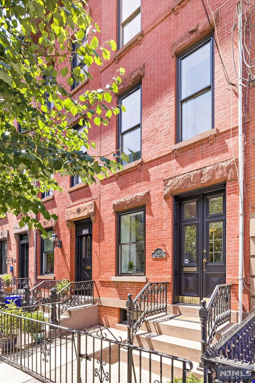 This uptown townhome is a lovely blend of original detail and modern upgrades including an open parlor floor layout that provides ample room for a living room, dining area and kitchen. The well-appointed kitchen features granite countertops, tile backsplash, and generous storage and stainless steel appliances including a Bosch dishwasher, LG stove and Samsung refrigerator. The kitchen leads to a wonderful deck area and then down to an inviting garden featuring pavers and a large lawn area. The second floor has a large living area a full sized bedroom and a beautifully renovated and timeless bathroom with a classic subway tile with mosaic accents. The top floor of the home has two more bedrooms, an abundance of closet space and a well-appointed bathroom, which boasts a double vanity with marble counters and Carrera marble hexagon floor tiles and classic subway tile and skylight in the full bath. The garden level features separate storage areas a rec room and a half bath. Some...