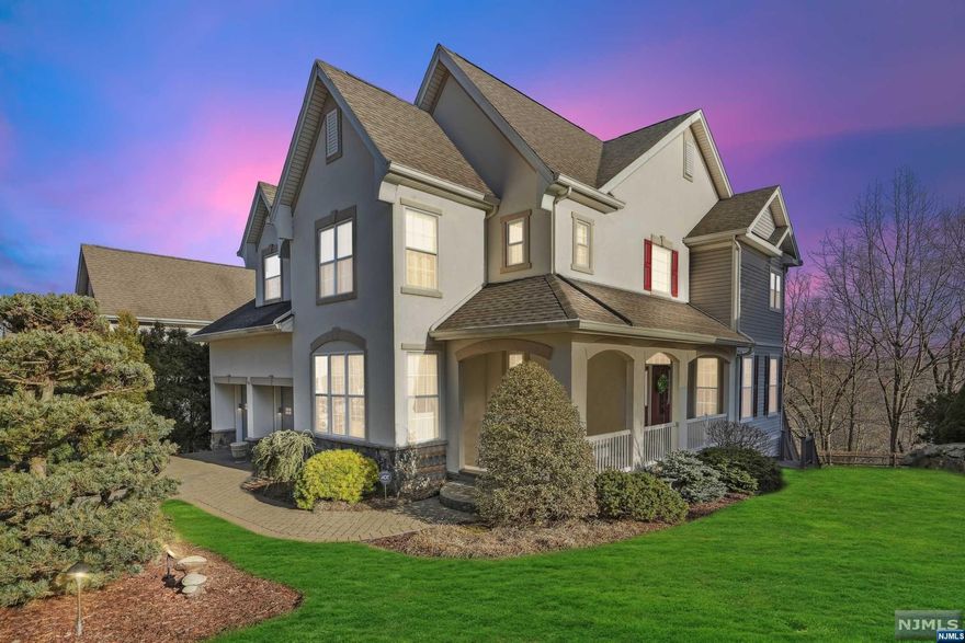 Elegant and refined, this custom colonial home is a sight to behold. Boasting 3 bedrooms and 4.5 bathrooms, this spacious property offers plenty of room for comfortable living with mountain views. It features a grand two-story foyer, formal dining room, family room, kitchen with top-of-the-line appliances and pantry space galore! The primary bedroom has a luxurious full bath and sitting area for relaxation. The finished basement includes a family room, rec room, game area, wet bar fun for parties and entertaining as well as an exercise room. Exterior is stucco/masonry construction with storm windows throughout ensuring safety during inclement weather conditions. Located in a cul-de-sac providing privacy yet easy access to local shops/restaurants; combined with all these incredible amenities make it clear why this stunning home is a must see!