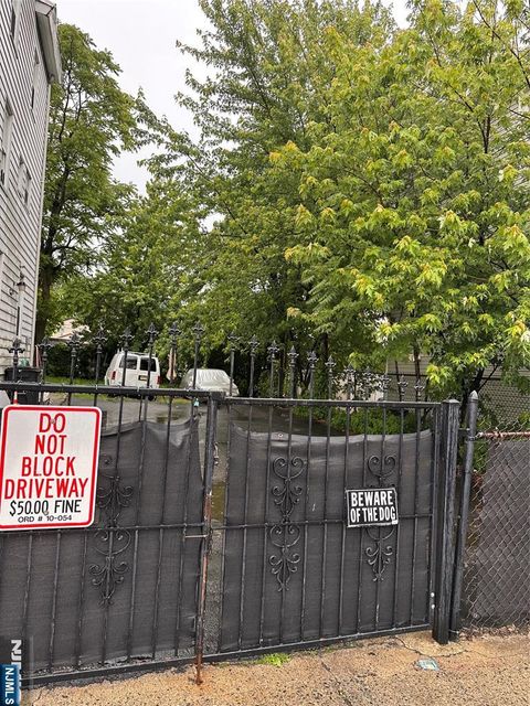 Photo of 74 Pennington Street, Paterson, NJ 07501 (MLS # 25018310)