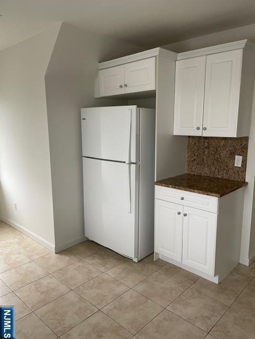 Beautiful modern, 3 bedroom 2 bath , walk to shopping, H Mart, banks, restaurants, post office, 1 block to major hi ways, and public transportation. Quiet residential area. Living room, dining area, eat in Kitchen. 3 Large Bedrooms, with walk in closets, 2 baths. Refrigerator, Microwave, gas stove, washer/dryer in unit. Central AC and gas heating. South, east and west exposure. very bright apartment. Custom shades in every room. 1 Car Garage, with 2 spaces in driveway No pets please.