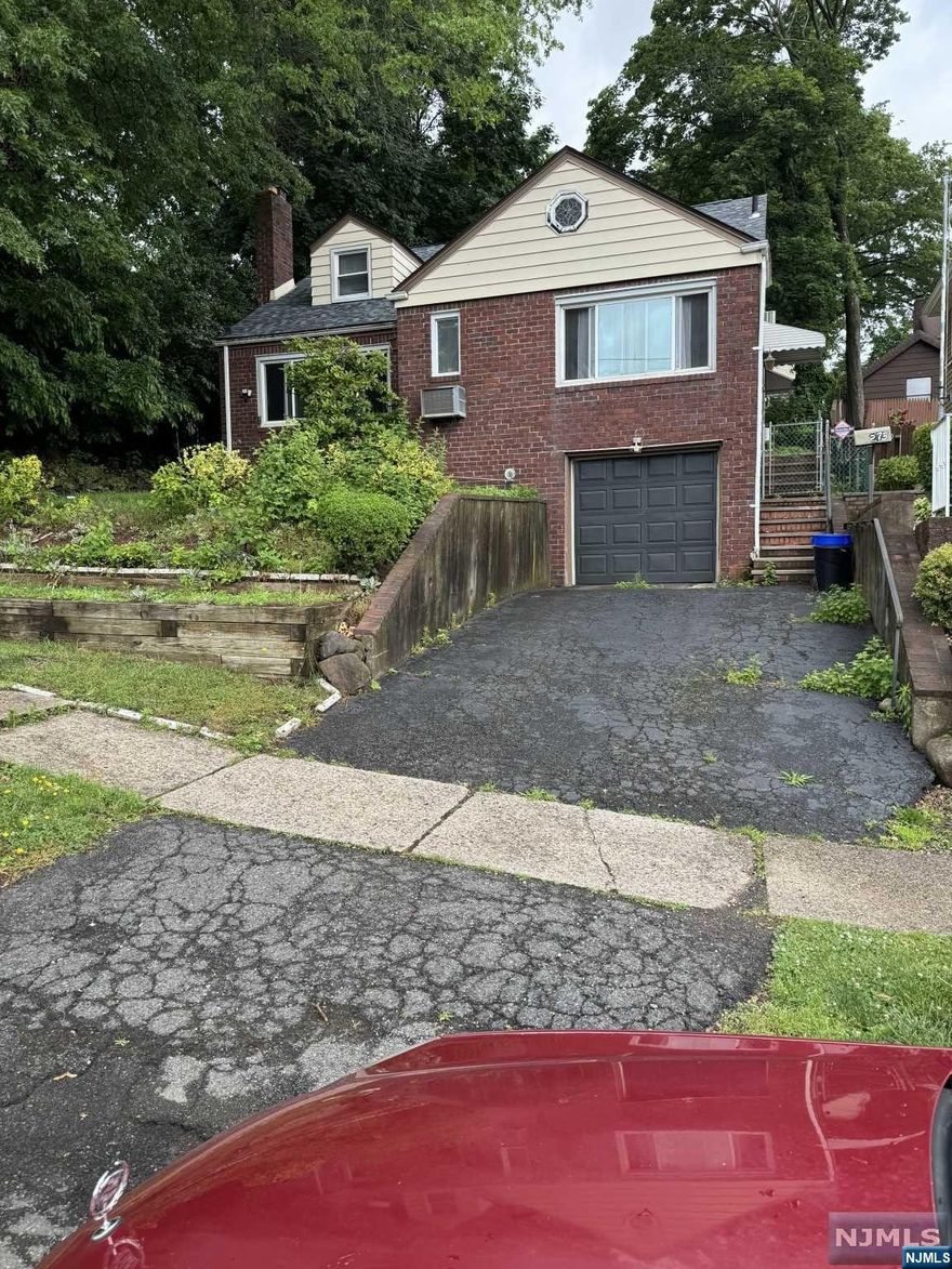 This expanded Cape Cod on a tree-lined street features L/R w/FPC, EIK with dining area, 2 BDRMS, Den, and updated Bath on the first Floor. On the second floor you will find a large M/BDRM, BR, & FB. Hardwood floors throughout. Fin BSMT, LNDRY RM, 1/2 Bath. Newer Roof, Newer Hot Water Heater. Near transportation, schools, parks, and worship. Tandem Garage