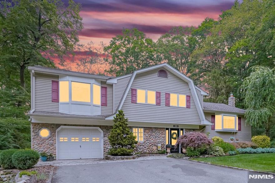 Nestled in a serene, tree-lined corner of Ringwood, this stunning split-level home offers the perfect blend of cozy charm and luxurious living. At almost 2,600 square feet of beautifully maintained space, this home invites you to experience warmth and elegance at every turn. The spacious, updated kitchen, truly the heart of this home, features high-end appliances and a welcoming layout that makes it a dream for culinary enthusiasts and entertainers alike. A gorgeous dining room overlooks the lush backyard and surrounding nature, creating an ideal backdrop for memorable gatherings with friends. Expansive windows throughout flood the home with natural light and frame peaceful views of the surroundings. The sellers have cherished how this home brings everyone together, with spacious areas inside and out that make every gathering feel special. Whether you're relaxing on a cozy evening or hosting a summer barbecue, this home was designed for connection and comfort. You'll also love the nearby hiking trails, perfect for outdoor adventures. Optional membership to the highly sought-after Cupsaw Lake community offers exclusive lake access, beach activities, and community events. Discover your private retreat in Ringwood, a true escape close to everything, in a neighborhood where neighbors quickly become friends.