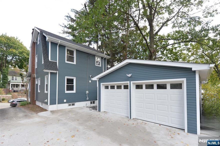 Move right into this beautifully renovated 3-bedroom, 2.5-bath home, updated from top to bottom with modern finishes. The inviting enclosed porch leads into a bright living room featuring a refaced fireplace. Enjoy cooking in the brand-new eat-in kitchen with quartz countertops and stainless-steel appliances, along with a convenient half bath on the first floor. Upstairs offers three comfortable bedrooms and a full bathroom. The fully finished basement expands your living space with a spacious living area, full bathroom, and washer/dryer. Outdoors, the large backyard includes a two-car garage and plenty of off-street parking, perfect for gatherings and recreation. Truly a move-in ready home with style and function, located on the border of Glen Ridge and just minutes from NYC transportation, local restaurants, and shops. Truly a must see!